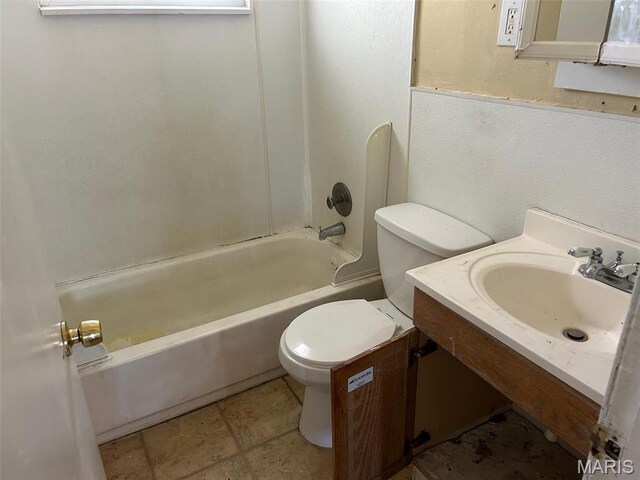 6016 Shillington Dr, Berkeley, MO 63134 - bathroom featuring toilet, shower / washtub combination, and vanity