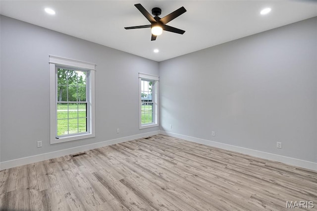 10102 Springer Dr, Bonne Terre, MO 63628 - unfurnished room featuring light wood finished floors, a ceiling fan, baseboards, and recessed lighting