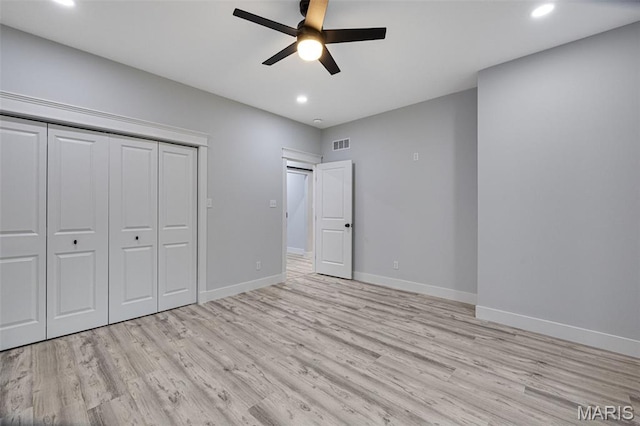 10102 Springer Dr, Bonne Terre, MO 63628 - unfurnished bedroom featuring light wood-style floors, baseboards, recessed lighting, a closet, and a ceiling fan