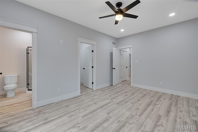 10102 Springer Dr, Bonne Terre, MO 63628 - unfurnished bedroom with light wood-style floors, recessed lighting, baseboards, and connected bathroom