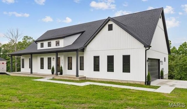 10102 Springer Dr, Bonne Terre, MO 63628 - rear view of house with covered porch, a yard, driveway, and roof with shingles