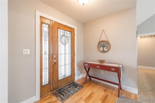21438 Lancaster Ln, Waynesville, MO 65583 - foyer with wood finished floors and baseboards