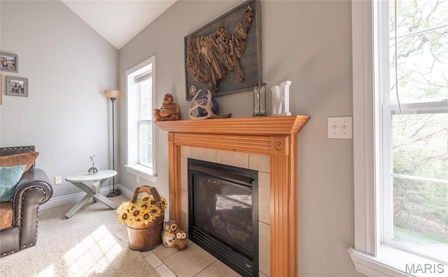 21438 Lancaster Ln, Waynesville, MO 65583 - living room with vaulted ceiling, a fireplace, and baseboards