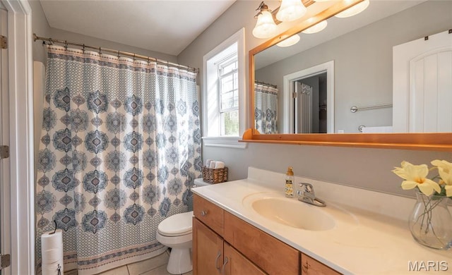 21438 Lancaster Ln, Waynesville, MO 65583 - bathroom featuring vanity, toilet, tile patterned flooring, and a shower with shower curtain