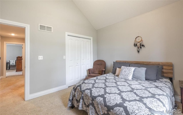 21438 Lancaster Ln, Waynesville, MO 65583 - bedroom with carpet floors, baseboards, a closet, and high vaulted ceiling