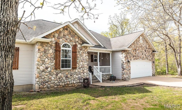 21438 Lancaster Ln, Waynesville, MO 65583 - view of front of home with stone siding, a porch, driveway, and a garage