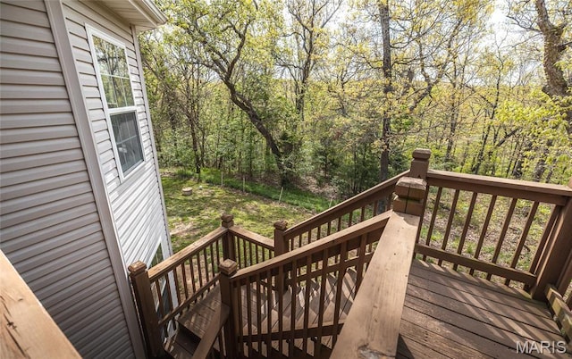 21438 Lancaster Ln, Waynesville, MO 65583 - wooden deck with a wooded view