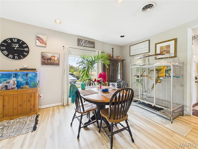 4627 County Road 651, Bernie, MO 63822 - dining space featuring wood finished floors, baseboards, and recessed lighting