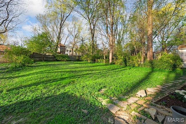 view of yard with fence