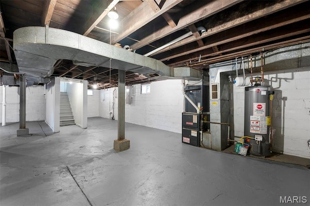 basement with water heater, stairway, heating unit, and electric panel