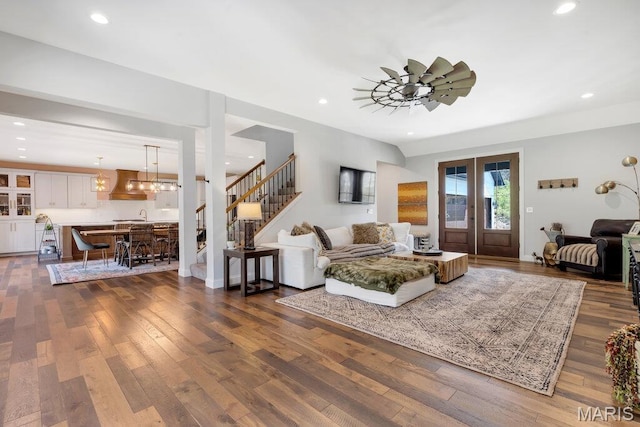 2509 Prairie Hollow Rd, Imperial, MO 63052 - living area featuring a chandelier, stairs, dark wood-type flooring, and recessed lighting