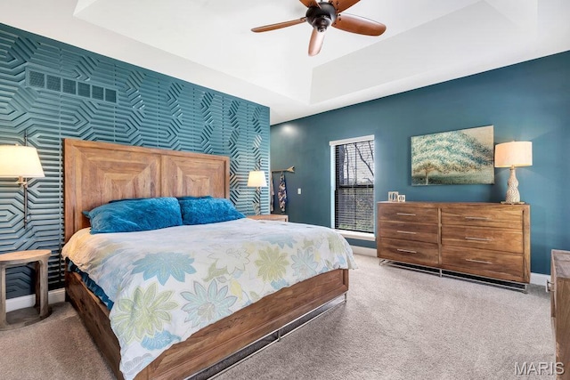 2509 Prairie Hollow Rd, Imperial, MO 63052 - carpeted bedroom with baseboards, a raised ceiling, and a ceiling fan