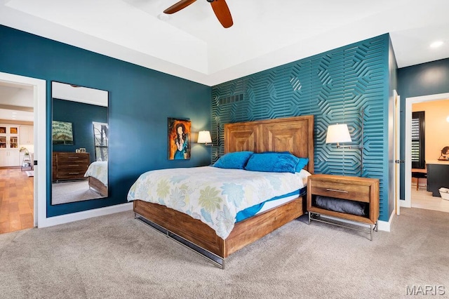 2509 Prairie Hollow Rd, Imperial, MO 63052 - carpeted bedroom with baseboards, an accent wall, a ceiling fan, and recessed lighting