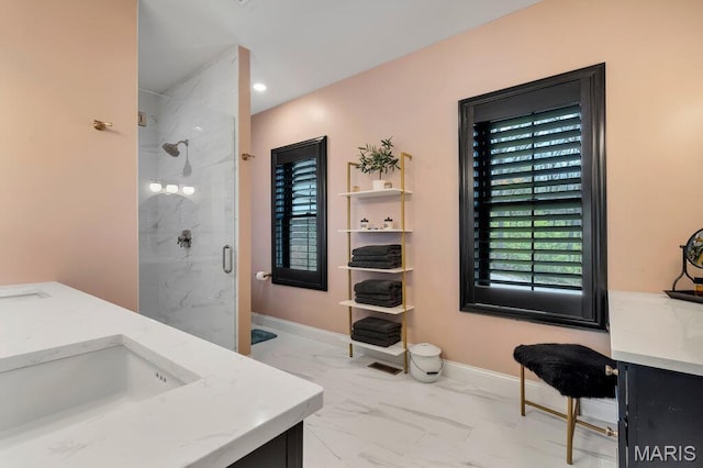 2509 Prairie Hollow Rd, Imperial, MO 63052 - full bath with marble look tile flooring, a marble finish shower, vanity, and baseboards
