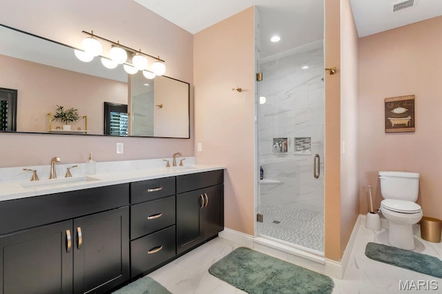 2509 Prairie Hollow Rd, Imperial, MO 63052 - bathroom featuring marble look tiles, a shower stall, toilet, double vanity, and recessed lighting