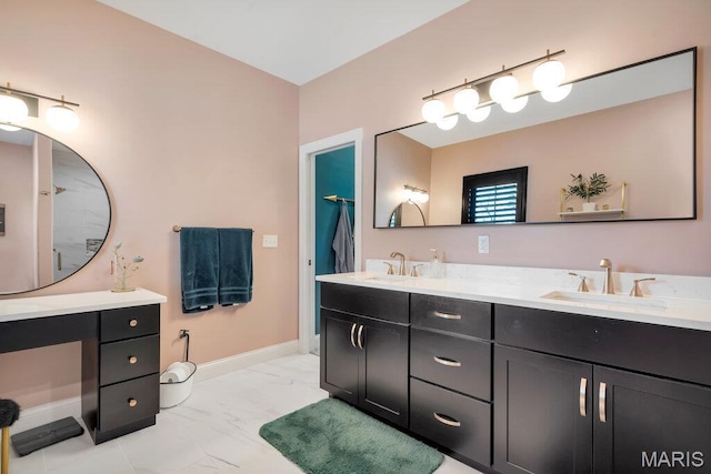 2509 Prairie Hollow Rd, Imperial, MO 63052 - bathroom featuring marble finish flooring, double vanity, and baseboards