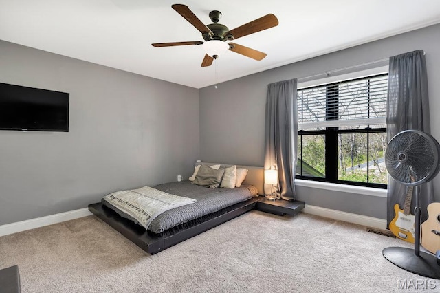 2509 Prairie Hollow Rd, Imperial, MO 63052 - carpeted bedroom with baseboards and a ceiling fan