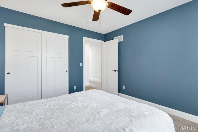 2509 Prairie Hollow Rd, Imperial, MO 63052 - bedroom with carpet flooring, baseboards, a closet, and a ceiling fan