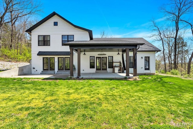 2509 Prairie Hollow Rd, Imperial, MO 63052 - rear view of house featuring a patio, a yard, ceiling fan, and french doors