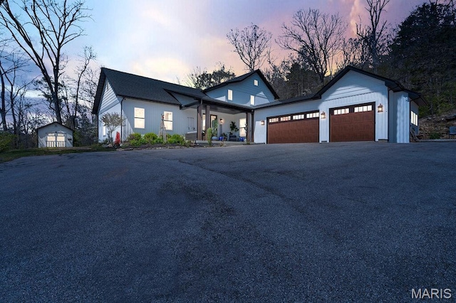 2509 Prairie Hollow Rd, Imperial, MO 63052 - view of front of home with asphalt driveway and a garage