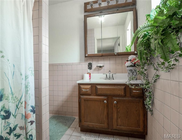 121 Ripley 142e-18, Doniphan, MO 63935 - full bath featuring tile walls, vanity, tile patterned floors, and a shower with curtain