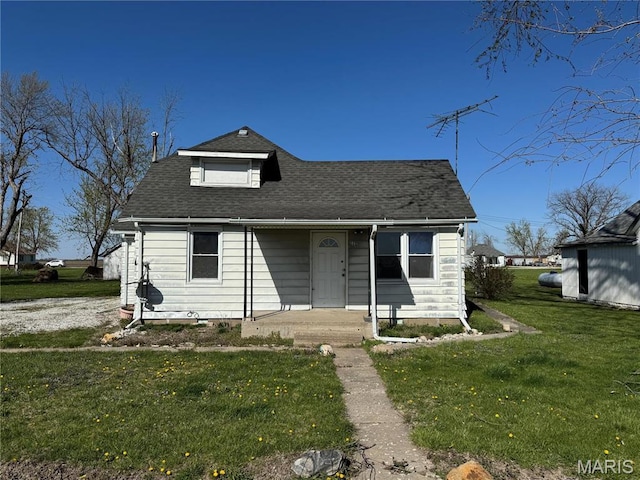 716 Kimball St, Baring, MO 63537 - bungalow-style home featuring a front lawn and roof with shingles