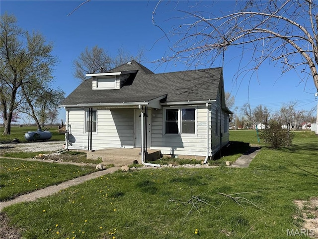 716 Kimball St, Baring, MO 63537 - bungalow-style house featuring a front yard and roof with shingles