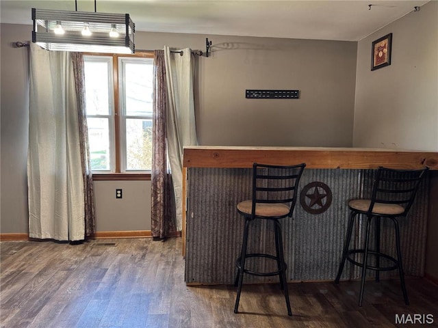 716 Kimball St, Baring, MO 63537 - indoor dry bar featuring wood finished floors and baseboards
