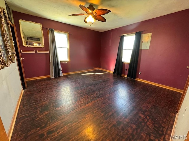 716 Kimball St, Baring, MO 63537 - empty room featuring a ceiling fan, wood finished floors, and baseboards