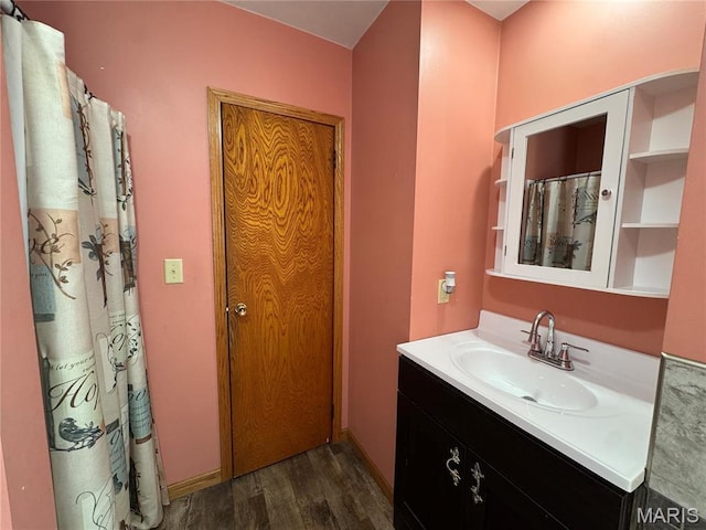 716 Kimball St, Baring, MO 63537 - bathroom featuring wood finished floors and vanity