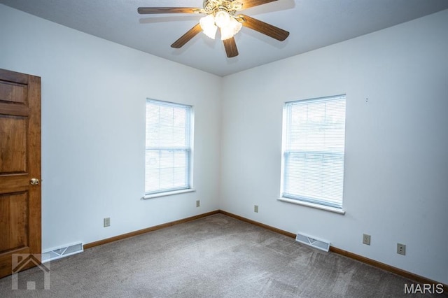 220 April Dr, Saint Robert, MO 65584 - spare room with carpet flooring, baseboards, and ceiling fan