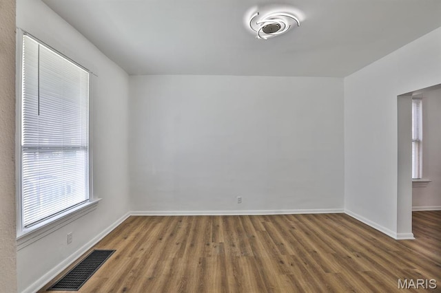 4417 Wallace St, Saint Louis, MO 63116 - spare room featuring wood finished floors and baseboards