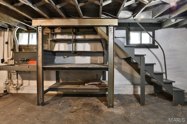 4417 Wallace St, Saint Louis, MO 63116 - basement featuring stairs and plenty of natural light