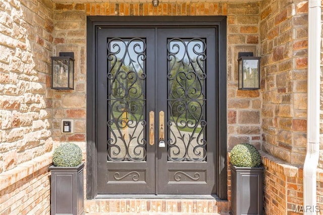 312 Oak Forest Dr, Jackson, MO 63755 - entrance to property featuring french doors and brick siding