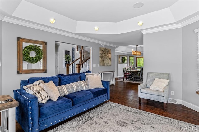 312 Oak Forest Dr, Jackson, MO 63755 - living room featuring a tray ceiling, ornamental molding, wood finished floors, stairs, and baseboards