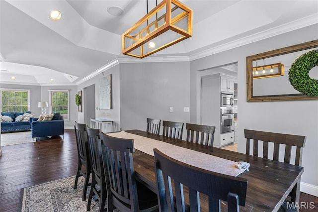 312 Oak Forest Dr, Jackson, MO 63755 - dining area featuring a raised ceiling, crown molding, wood finished floors, recessed lighting, and baseboards