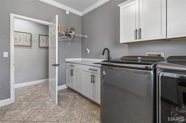 312 Oak Forest Dr, Jackson, MO 63755 - washroom with cabinet space, ornamental molding, washing machine and clothes dryer, and baseboards