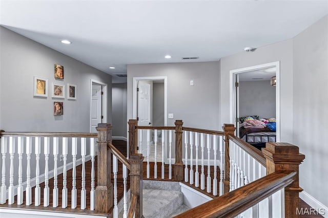 312 Oak Forest Dr, Jackson, MO 63755 - corridor featuring an upstairs landing, wood finished floors, recessed lighting, and baseboards