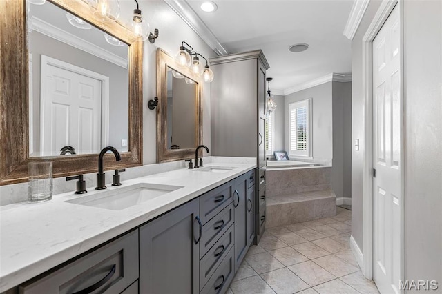 312 Oak Forest Dr, Jackson, MO 63755 - full bathroom featuring crown molding, double vanity, a garden tub, tile patterned flooring, and baseboards