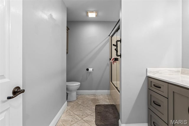 312 Oak Forest Dr, Jackson, MO 63755 - full bathroom featuring baseboards, toilet, vanity, and bath / shower combo with glass door