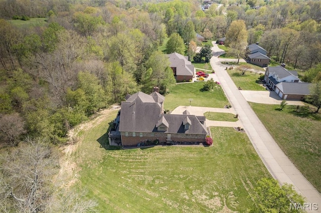 312 Oak Forest Dr, Jackson, MO 63755 - aerial view of property and surrounding area featuring a heavily wooded area