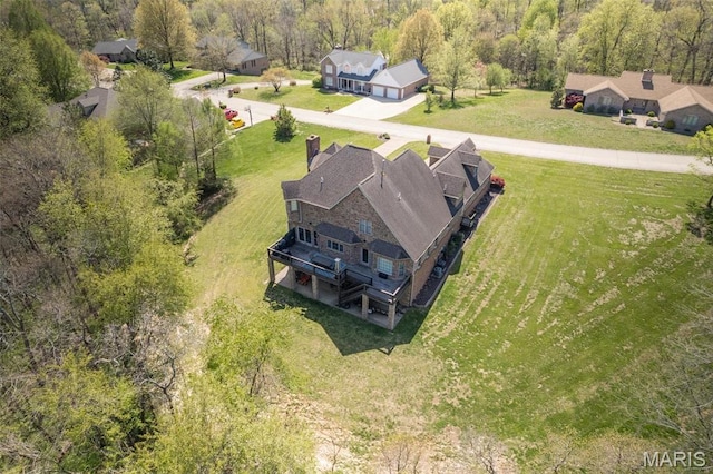 312 Oak Forest Dr, Jackson, MO 63755 - aerial view of property and surrounding area with a heavily wooded area