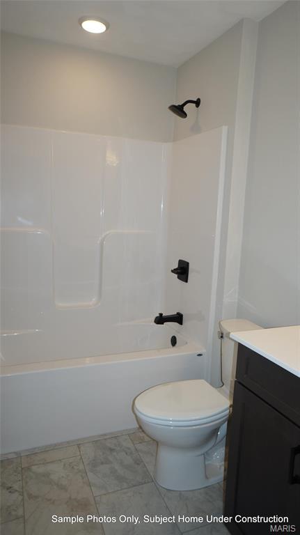 2028 Ravenel, Swansea, IL 62226 - bathroom with vanity, toilet,  shower combination, and marble finish floors