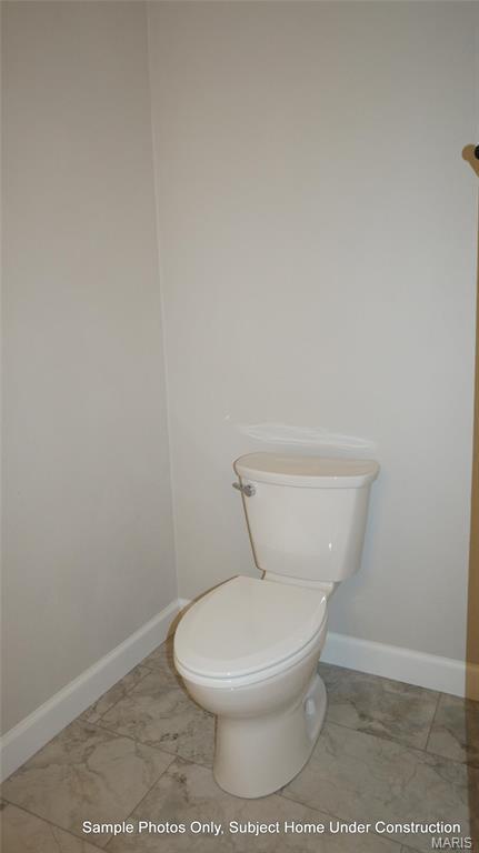 2028 Ravenel, Swansea, IL 62226 - bathroom with marble finish flooring, toilet, and baseboards