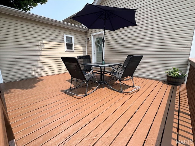 311 S Hibbard St, Staunton, IL 62088 - wooden terrace with outdoor dining space