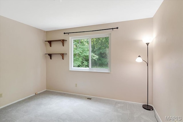 1115 Pinrun Dr, Ballwin, MO 63011 - carpeted spare room with baseboards