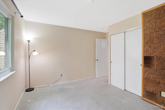 1115 Pinrun Dr, Ballwin, MO 63011 - unfurnished bedroom with carpet flooring, a closet, and baseboards