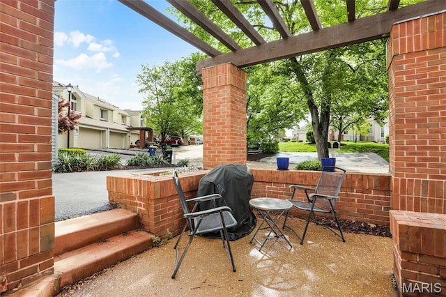 1709 Highview Circle Ct, Ballwin, MO 63021 - view of patio / terrace with a grill, a pergola, and a residential view