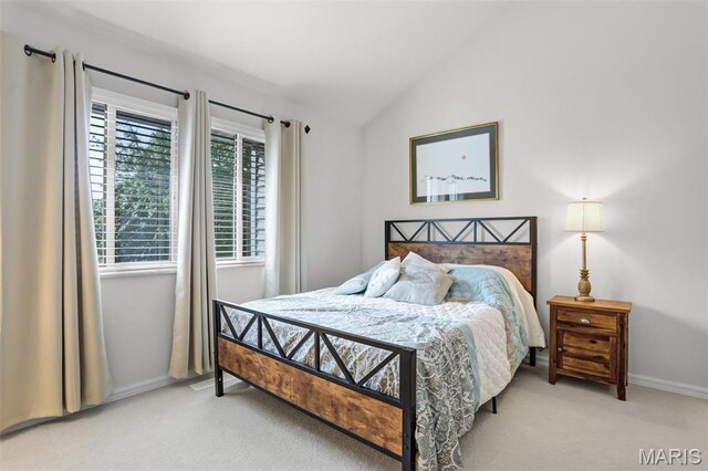 1709 Highview Circle Ct, Ballwin, MO 63021 - bedroom featuring light colored carpet, vaulted ceiling, and baseboards