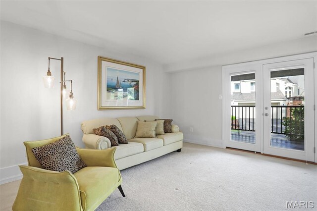 1709 Highview Circle Ct, Ballwin, MO 63021 - carpeted living area featuring french doors and baseboards